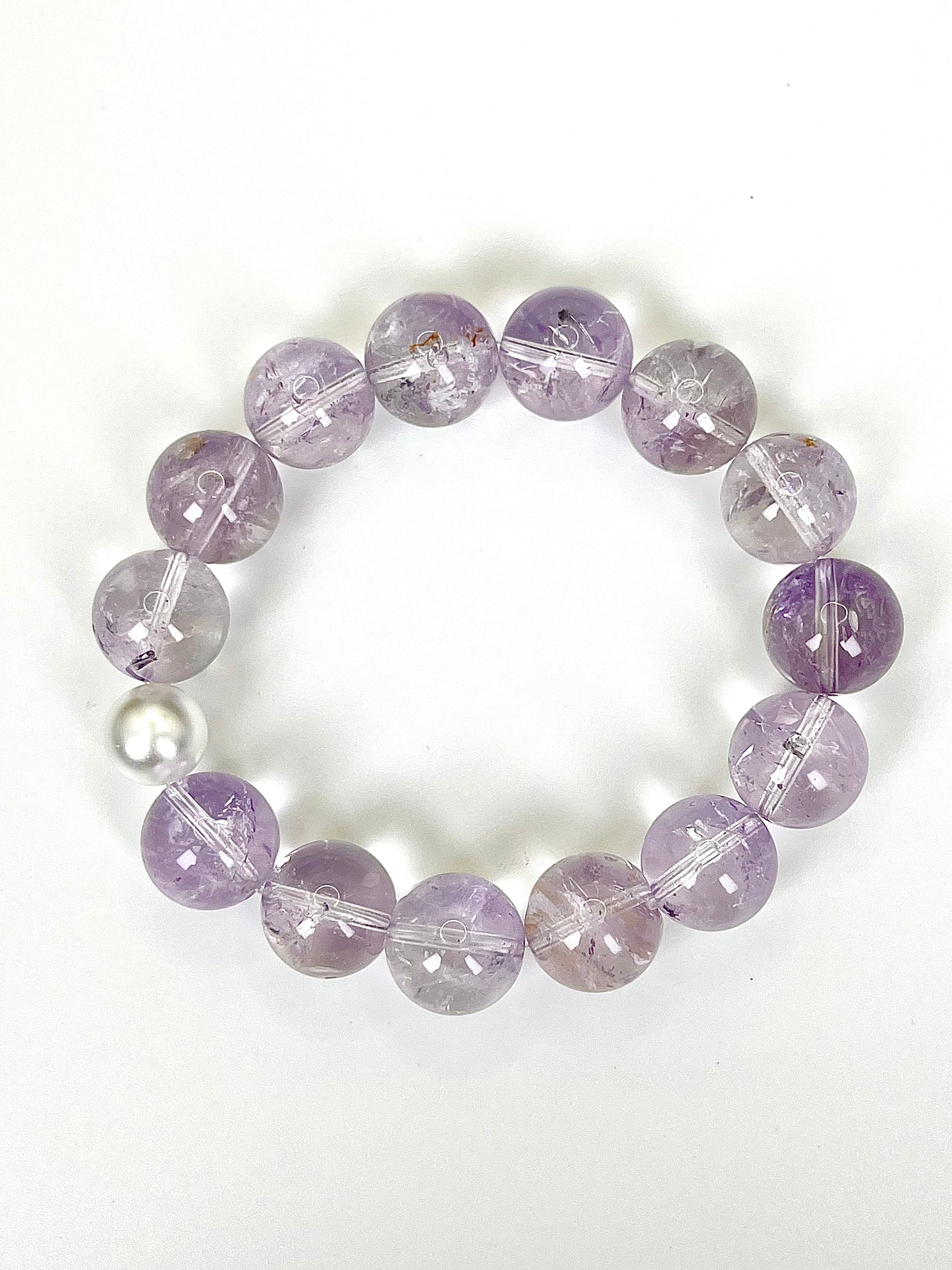 Lavender Amethyst Pearl Bracelet: Pale lavender amethyst crystals combined with smooth pearls.