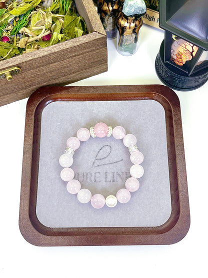 Sweet Pink Crystal Bracelet: Round pink crystals adorned with delicate silver accents